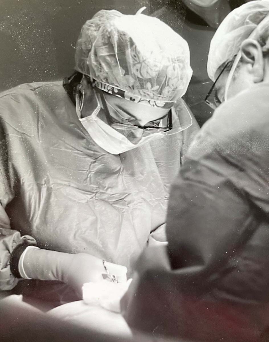Drs. Ziyad and Monica Hannon supporting each other in surgery